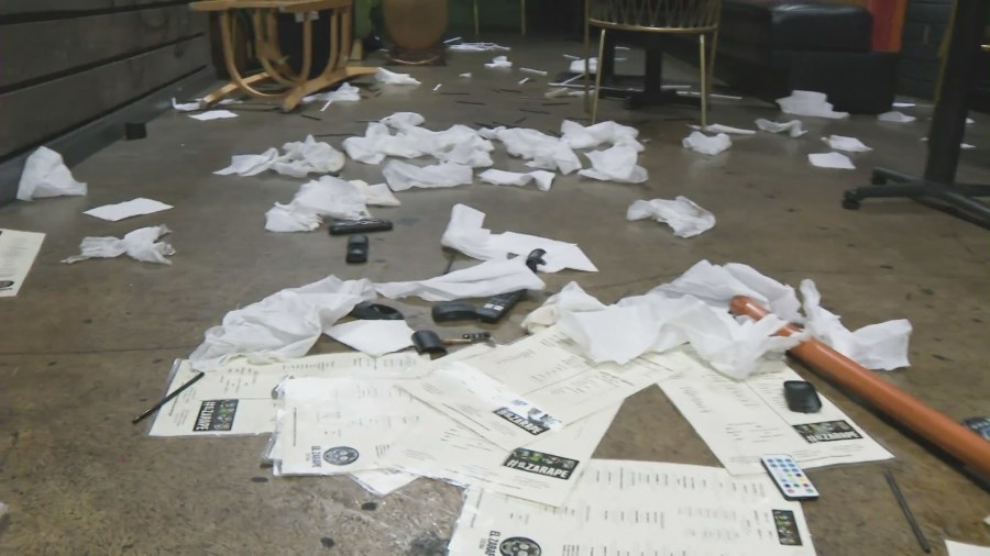 Items thrown across the floor by a suspect who burglarized and vanadalized El Zarape on Feb. 26, 2024. (KTLA)