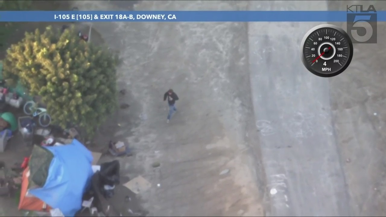 A possible suspect after authorities pursued a stolen pickup truck that crashed into a drainage canal in Los Angeles County on Feb. 2, 2024. (KTLA)