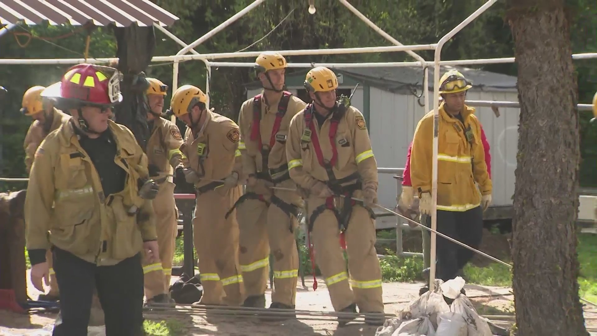 Fire crews worked to rescue a 1,200-pound horse named Lucky that had been swallowed by a sinkhole in Lake View Terrace on Feb. 21, 2024. (KTLA)