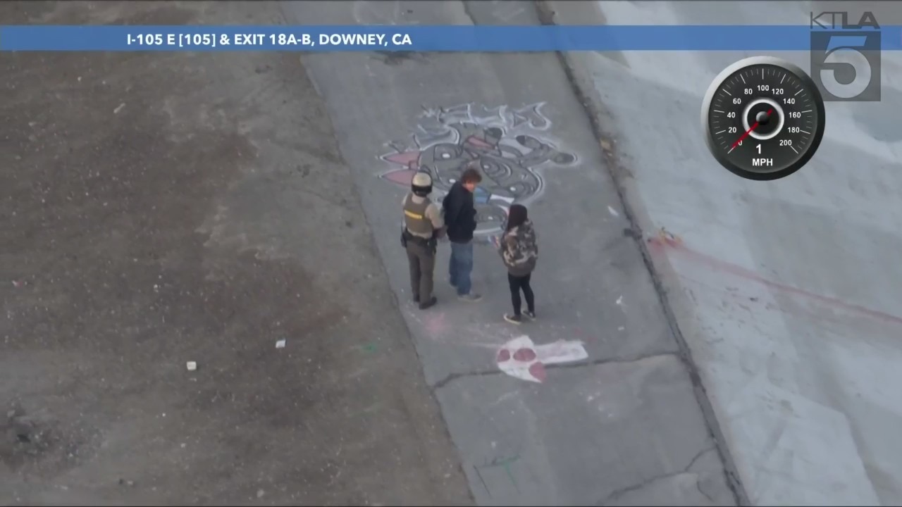 A possible suspect after authorities pursued a stolen pickup truck that crashed into a drainage canal in Los Angeles County on Feb. 2, 2024. (KTLA)