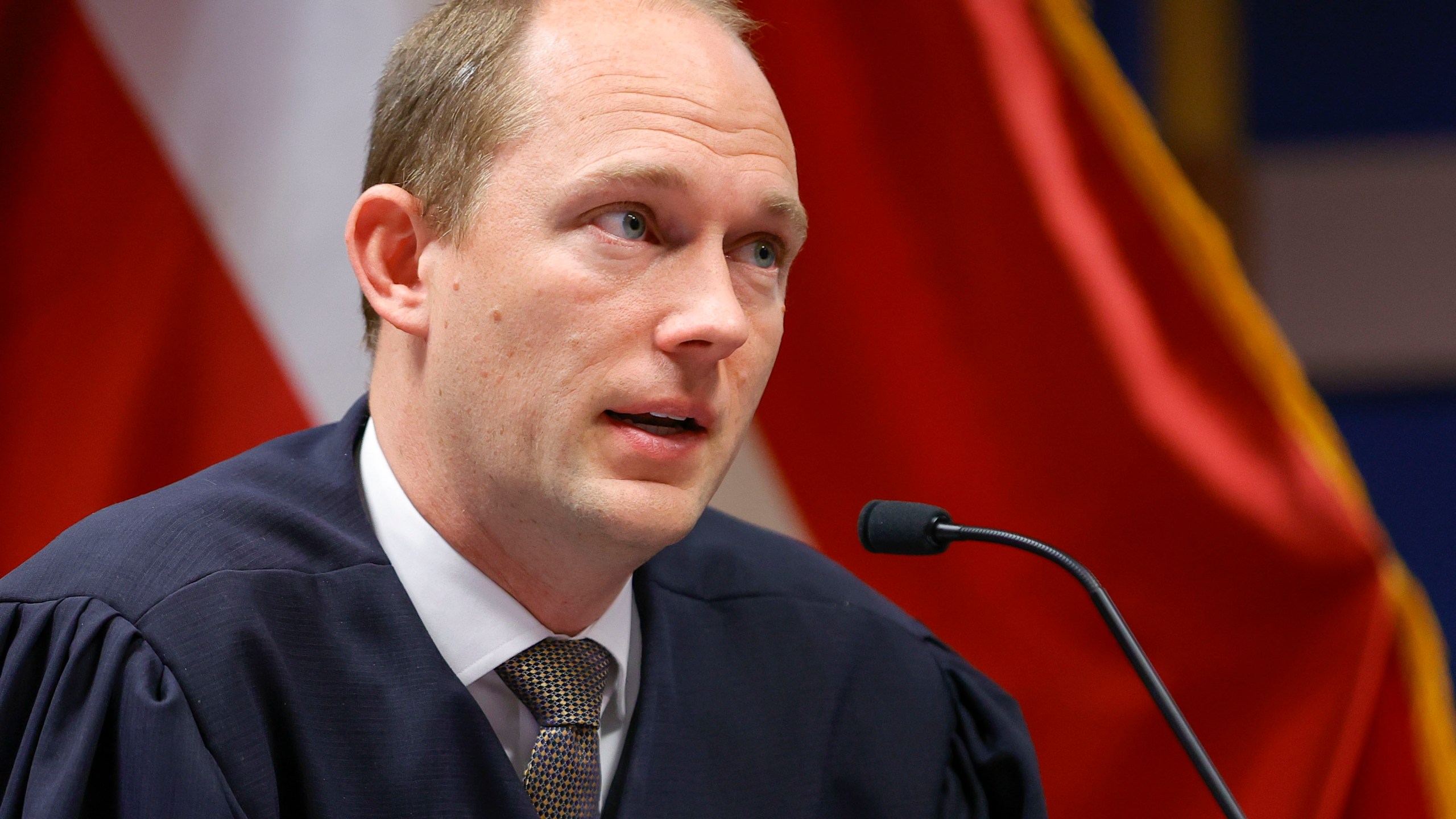 Fulton County Superior Judge Scott McAfee presides in court, Friday, March, 1, 2024, in Atlanta. The hearing is to determine whether Fulton County District Attorney Fani Willis should be removed from the case because of a relationship with Nathan Wade, special prosecutor she hired in the election interference case against former President Donald Trump. (AP Photo/Alex Slitz, Pool)