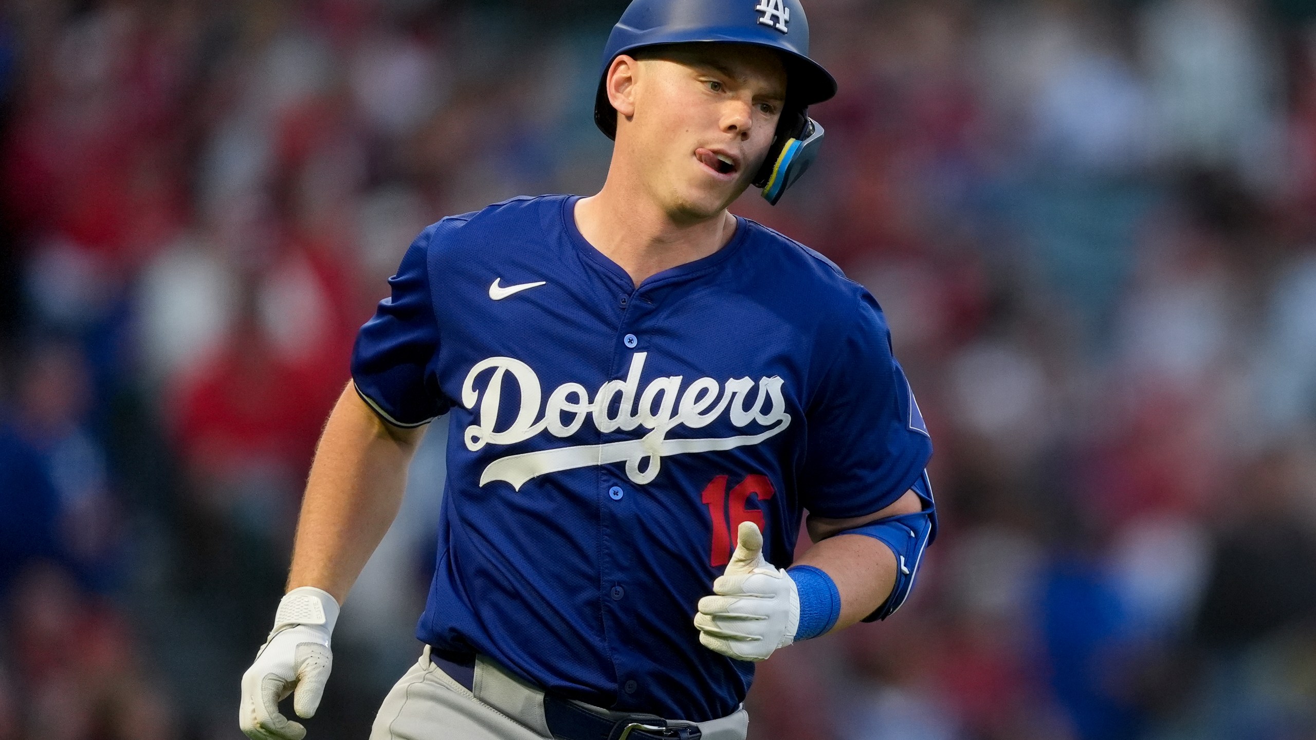 Los Angeles Dodgers' Will Smith runs hitting a home run during the fourth inning of the team's exhibition baseball game against the Los Angeles Angels, Tuesday, March 26, 2024, in Anaheim, Calif. (AP Photo/Ryan Sun)