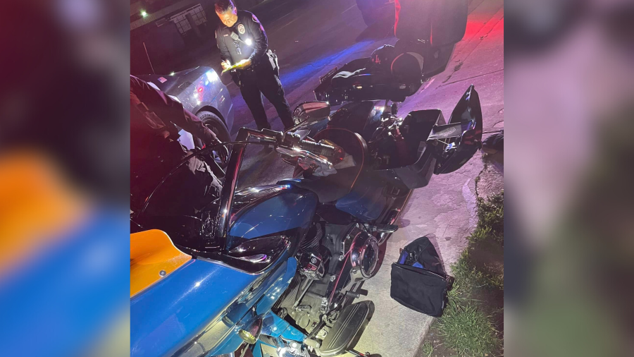 Police search a motorcycle following a pursuit in Irwindale on March 23, 2024.