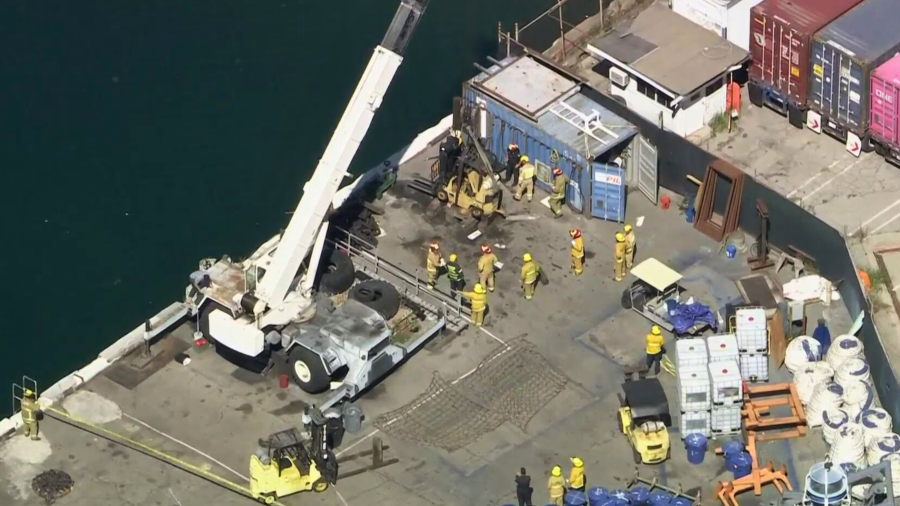 Emergency crews respond to a forklift accident at the Port of Los Angeles on March 18, 2024.