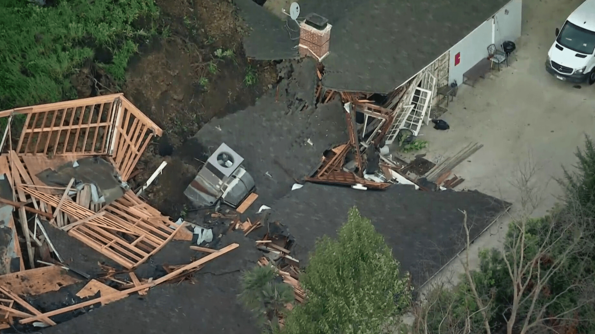 A home is red tagged after a mudslide in Sherman Oaks on March 13, 2024.