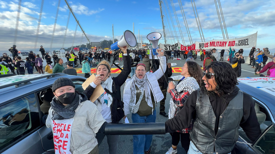 Demonstrators shut down the San Francisco Oakland Bay Bridge in conjunction with the APEC Summit taking place Thursday, Nov. 16, 2023, in San Francisco.