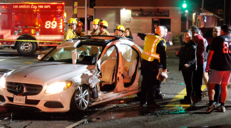 Mercedes driver blows through red light, slams into SUV