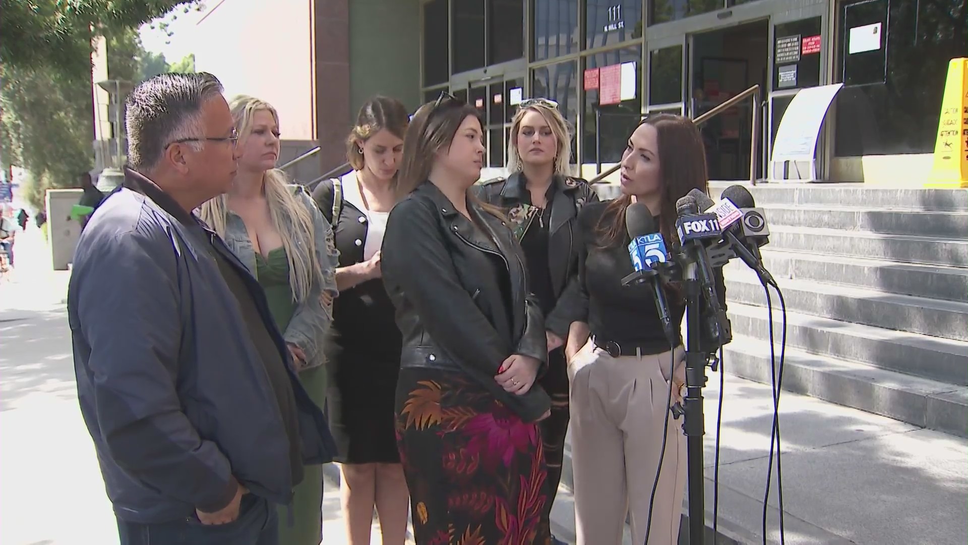 A group of defendants hold a press conference on March 20, 2024 addressing a lawsuit involving comments about a man on a Facebook group called "Are We Dating The Same Guy?" (KTLA)