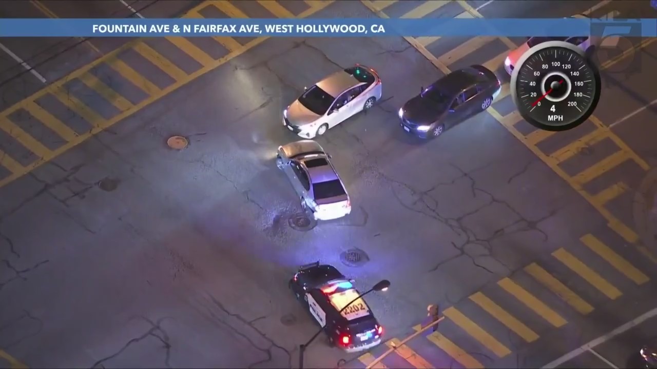 A suspect in a stolen vehicle nearly crashes head-on into a vehicle during a pursuit on March 29, 2024. (KTLA)