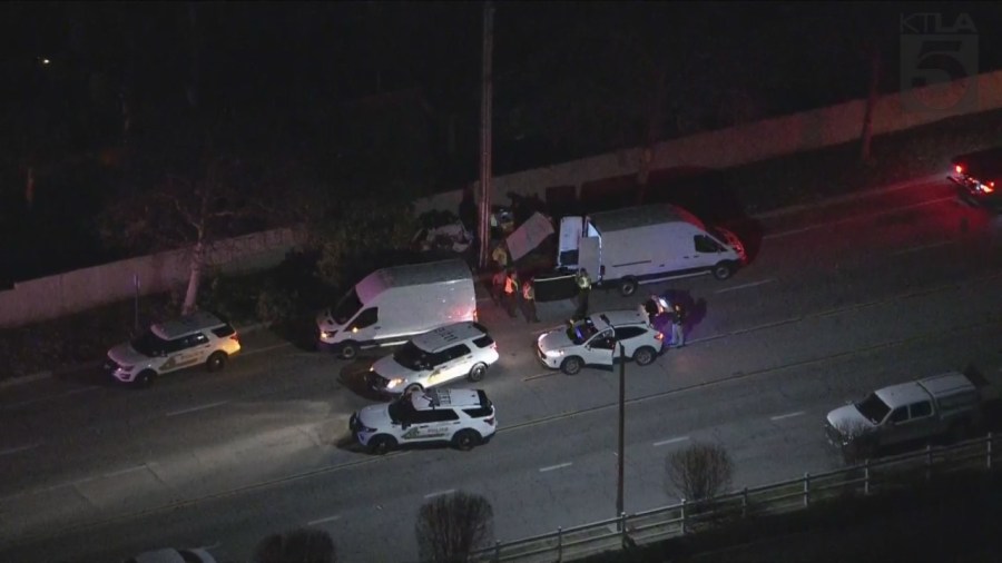 Investigators at the scene of a fatal single-vehicle accident in Rancho Cucamonga that left two teens dead on March 8, 2024. (KTLA)