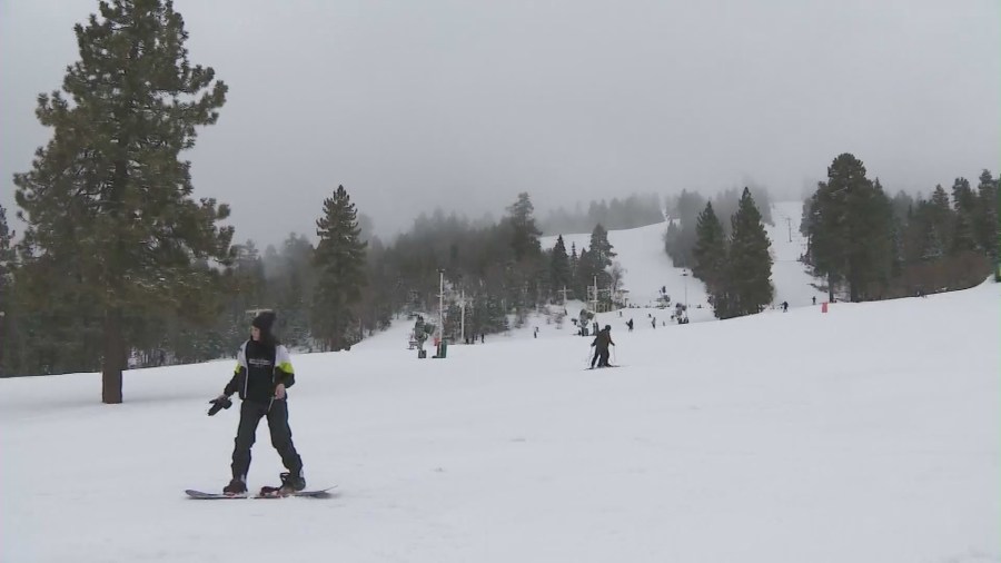 Skiers and snowboarders enjoying the slopes at Mountain High Resort in Wrightwood, California. (KTLA)