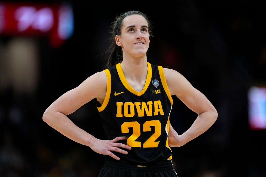 Iowa guard Caitlin Clark stands on the court during the second half of the Final Four college basketball championship game against South Carolina in the women's NCAA Tournament, Sunday, April 7, 2024, in Cleveland. (AP Photo/Carolyn Kaster)