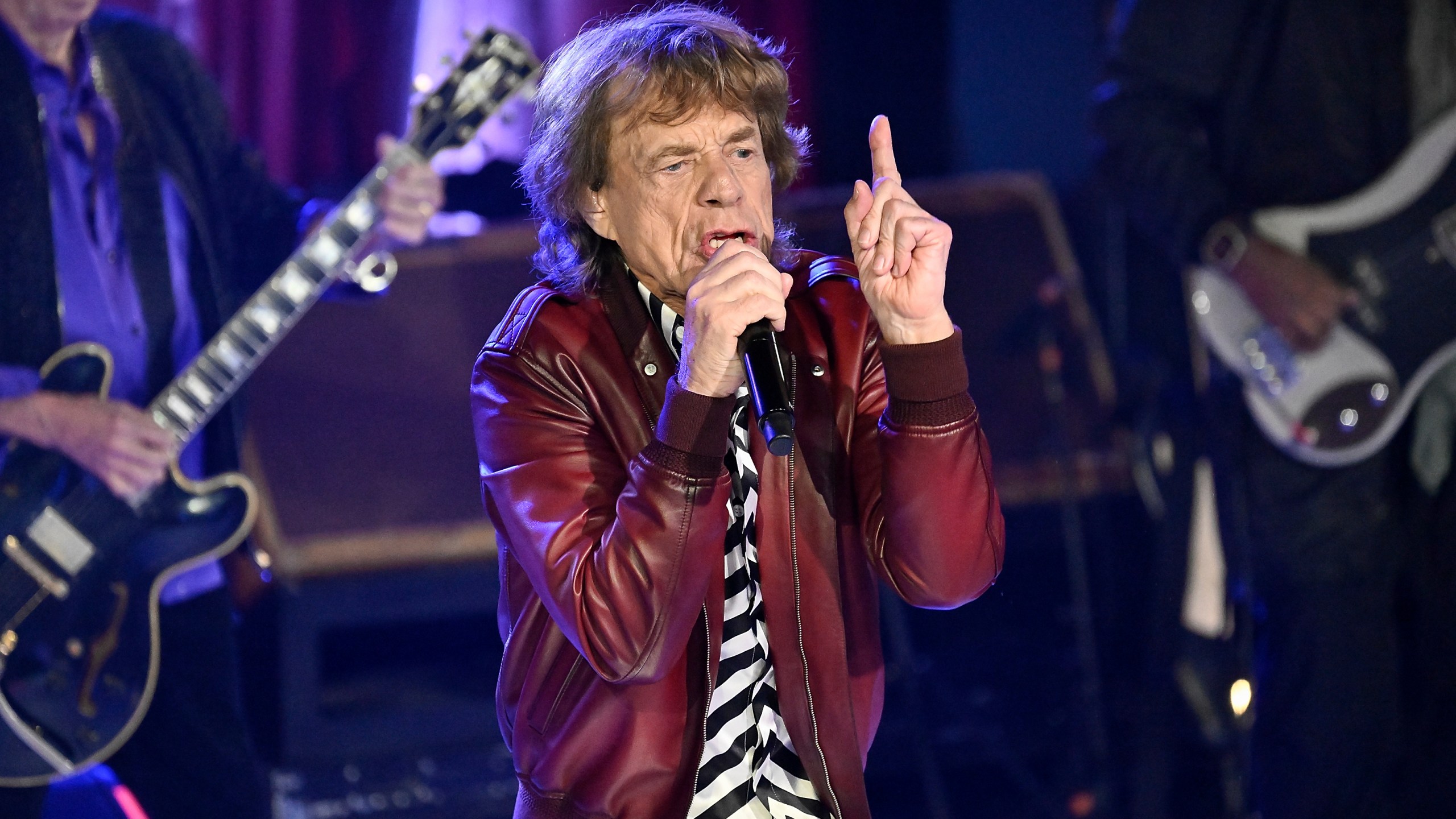 FILE - Mick Jagger of The Rolling Stones performs during a celebration for the release of their new album "Hackney Diamonds," Oct. 19, 2023, in New York. The 2024 New Orleans Jazz & Heritage festival, which spans two weekends, was set to open Thursday, April 25, 2024, with dozens of acts big and small playing daily on 14 stages spread throughout the historic Fair Grounds race course. The Stones play next Thursday, May 2, and tickets for that day of music have long been sold out. (Photo by Evan Agostini/Invision/AP, File)