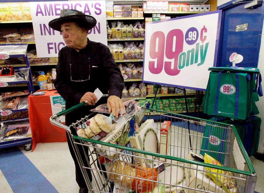 Jacques Elsair shops at the 99 cent Only store in Los Angeles Monday, Sept 8, 2008. The discount retailer announced Monday the first price increase in the chain's 26-year history by raising the cost of household items, food and other items by almost a penny. The company blamed rising inflation, food and energy prices for the new 99.99 cent price. (AP Photo/Nick Ut)