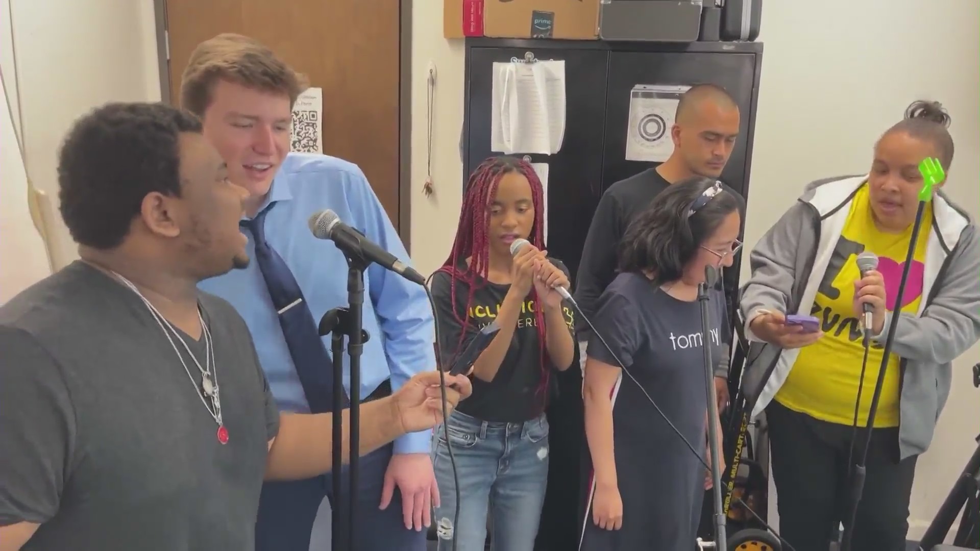 Students making music at a practice session with Jazz Hands for Autism. (KTLA)