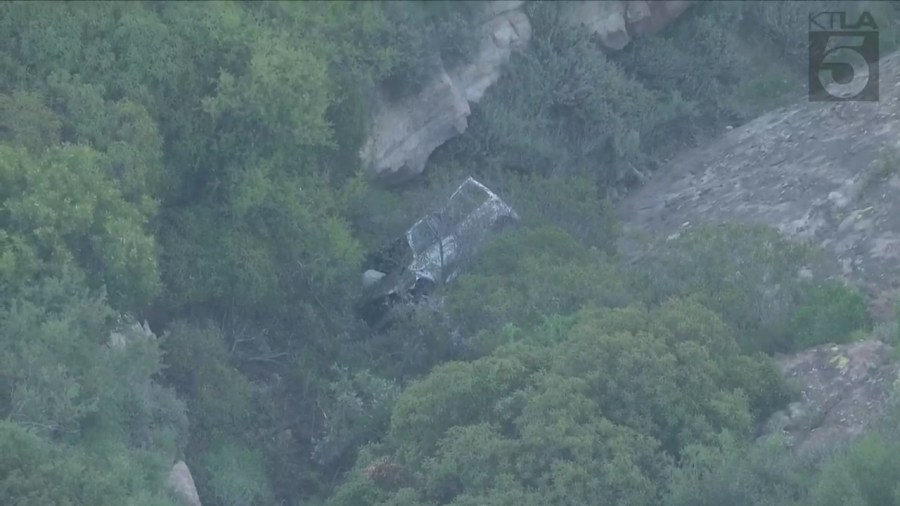 One person was killed after a vehicle crashed off a cliffside in Malibu on April 3, 2024. (KTLA)