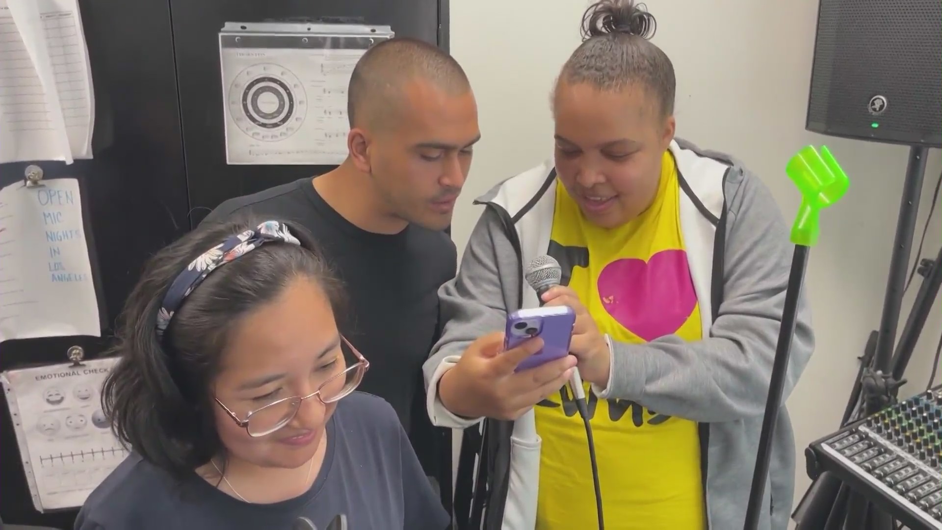 Students making music at a practice session with Jazz Hands for Autism. (KTLA)