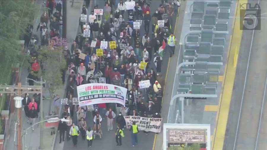 Group of protestors leaving USC's campus and continuing to march down surrounding streets on April 24, 2024. (KTLA)