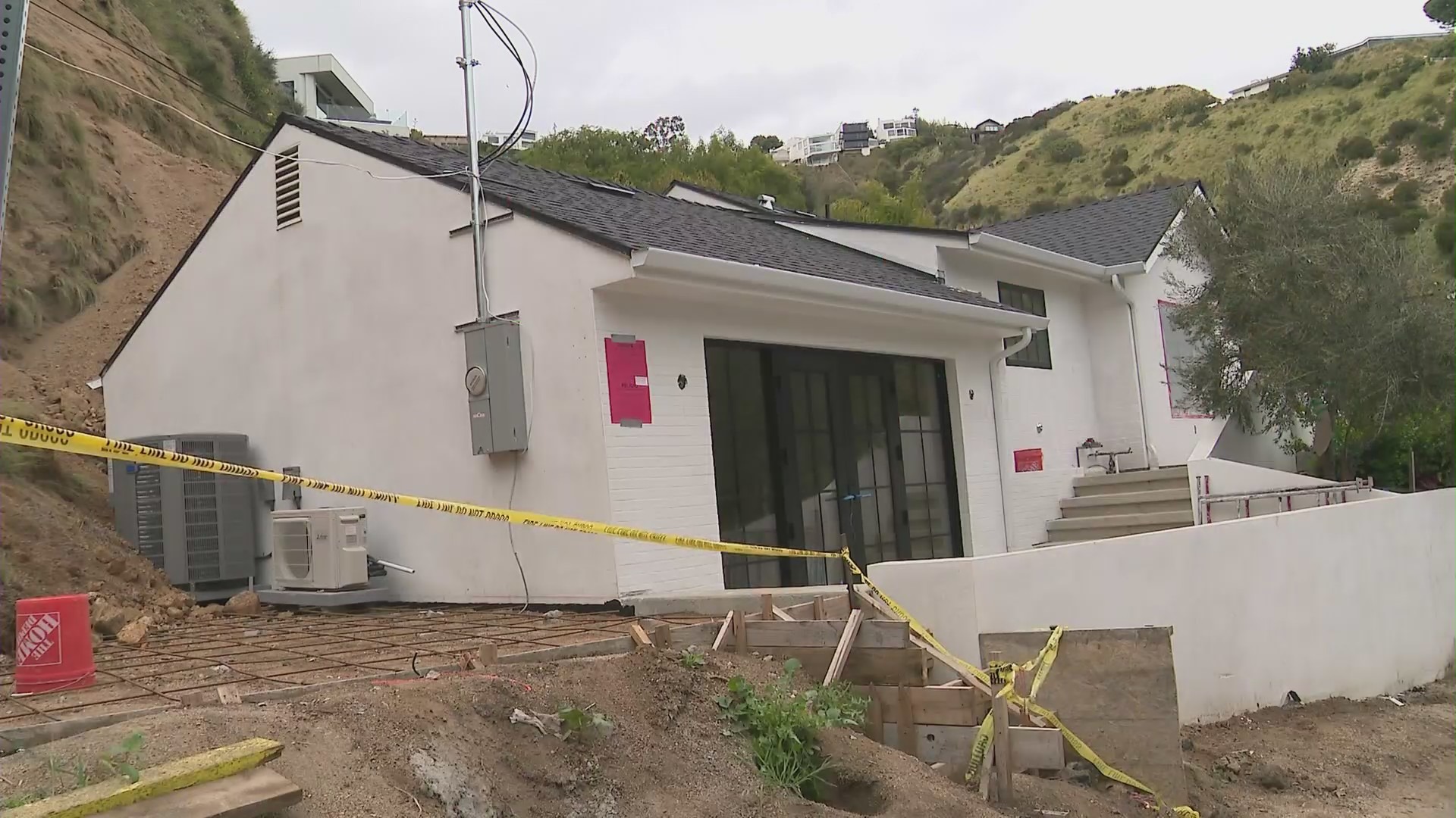 A Hollywood Hills home was partially buried by a large landslide on April 4, 2024. (KTLA)