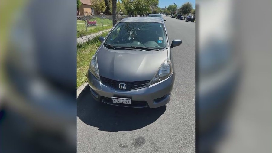 A Honda Fit damaged by the suspect in Burbank. (KTLA)