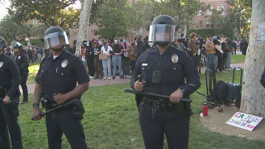 Police in riot gear dispersing pro-Palestinian demonstrators at the University of Southern California on April 24, 2024. (KTLA)