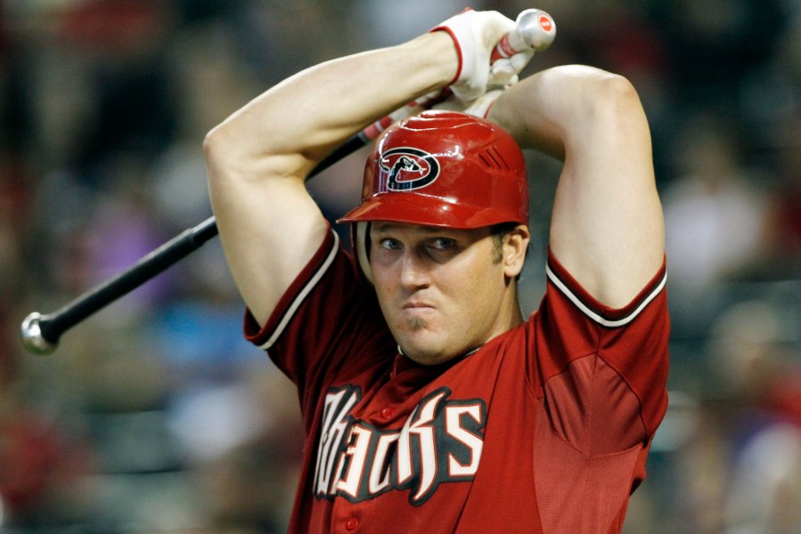 FILE - Arizona Diamondbacks' Sean Burroughs warms up prior to batting during a baseball game against the New York Mets, Sunday, Aug. 14, 2011, in Phoenix. Burroughs, a two-time Little League World Series champion who won an Olympic gold medal and went on to a major league career that was interrupted by substance abuse, has died. He was 43. The Los Angeles County Medical Examiner’s online records said Burroughs died Thursday, May 9, 2024, with the cause of death deferred. (AP Photo/Ross D. Franklin, File)