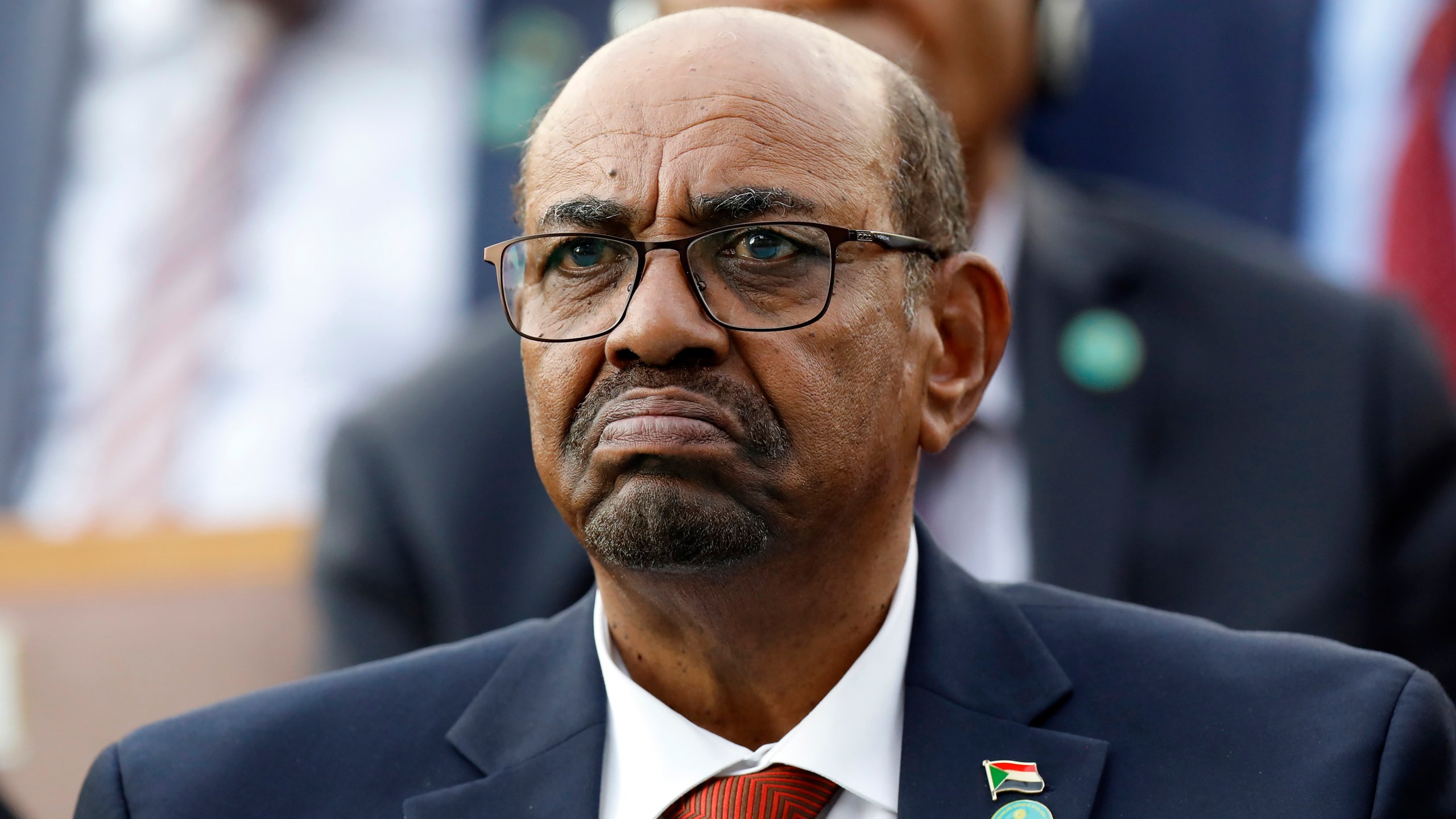 FILE - Sudan's President Omar al-Bashir attends a ceremony for Turkey's President Recep Tayyip Erdogan, at the Presidential Palace, July 9, 2018, in Ankara, Turkey. Ousted Sudanese strongman Omar al-Bashir was charged by the International Criminal Court on allegations including genocide in his country's Darfur region. (AP Photo/Burhan Ozbilici, File)