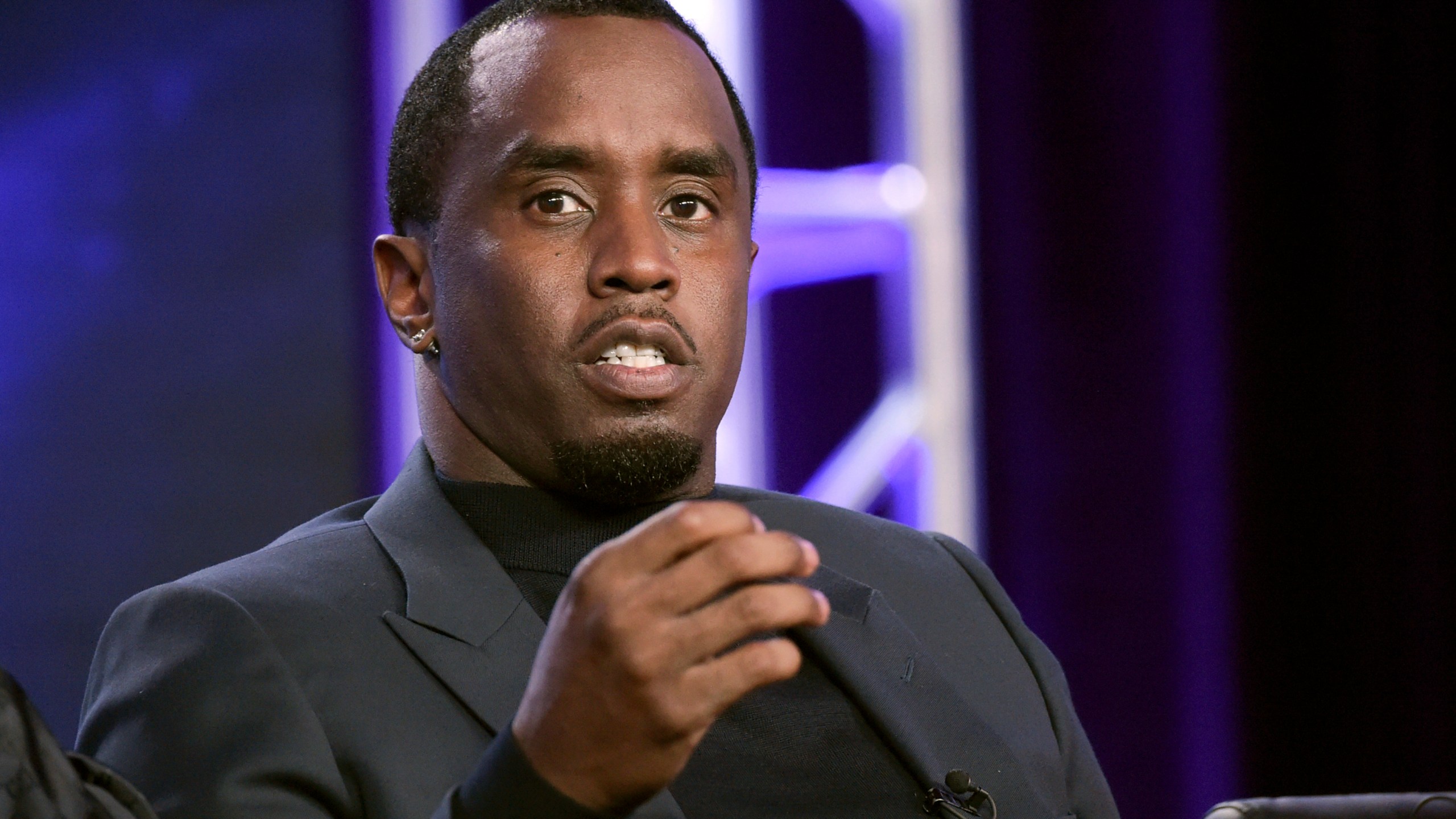 FILE -Sean 'Diddy' Combs participates in "The Four" panel during the FOX Television Critics Association Winter Press Tour in Pasadena, Calif., Jan. 4, 2018. A former model accused Combs of sexually assaulting her at his New York City recording studio in 2003 in a lawsuit filed Tuesday, May 21, 2024, the latest in a series of allegations against the embattled hip-hop mogul. (Photo by Richard Shotwell/Invision/AP, File)