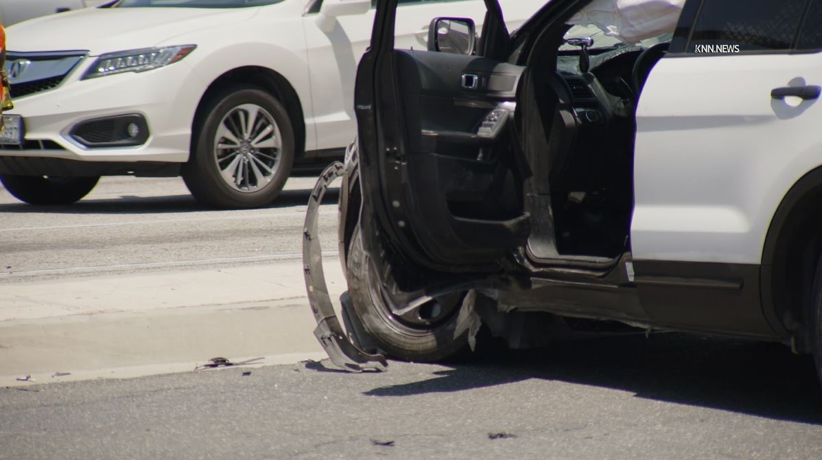 Auto debris was dispersed across the roadway during a rollover crash involving a deputy vehicle in Santa Clarita on May 29, 2024. (KNN)