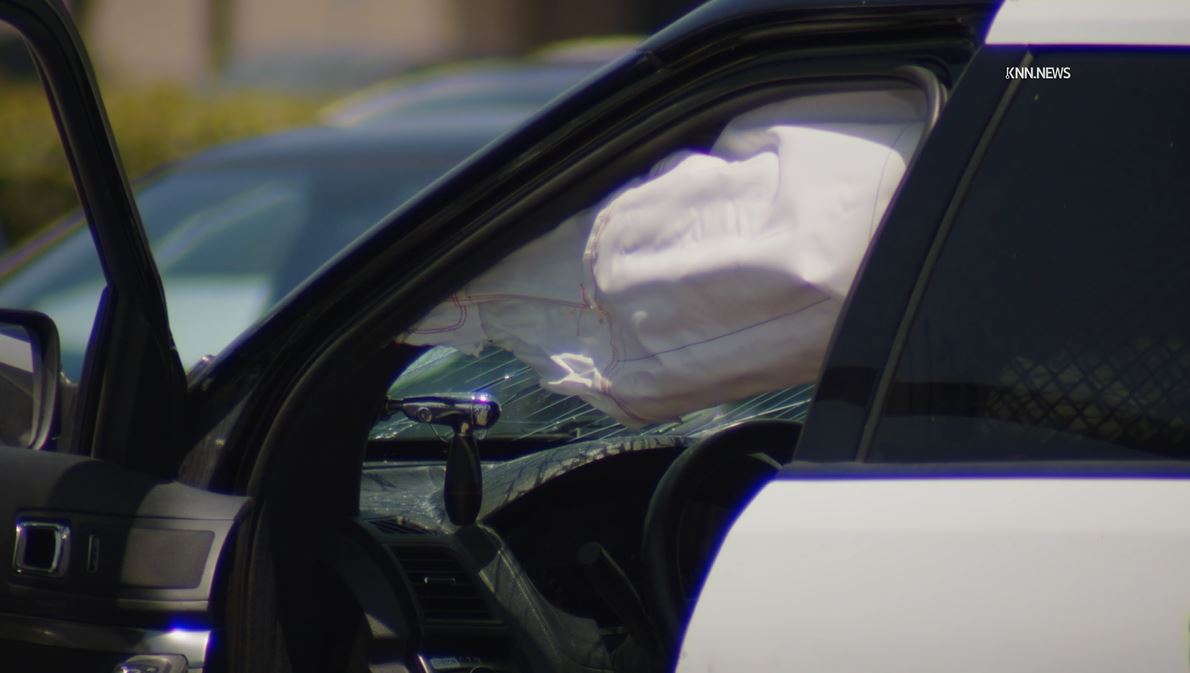 Auto debris was dispersed across the roadway during a rollover crash involving a deputy vehicle in Santa Clarita on May 29, 2024. (KNN)