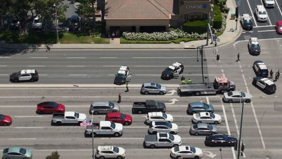 Paramedics arrived on scene after a violent rollover crash involving an L.A. County sheriff's deputy in Santa Clarita on May 29, 2024. (KNN)