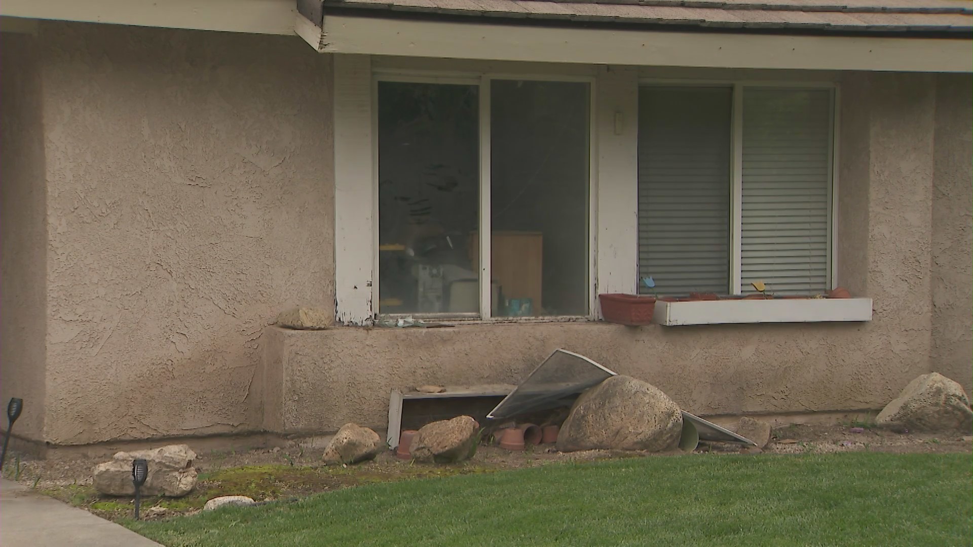 A window screen damaged by "Oreo" the bear while it was searching for food in Monrovia.