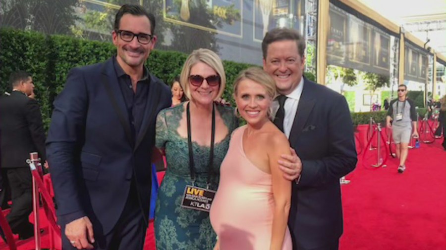 Jessica Holmes and Sam Rubin reporting from the red carpet. (KTLA)