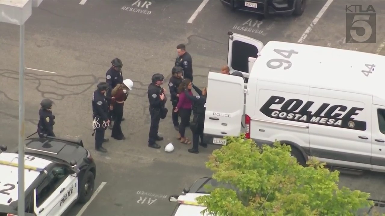 Protestors being arrested at UC Irvine after being declared an unlawful assembly on May 15, 2024. (KTLA)