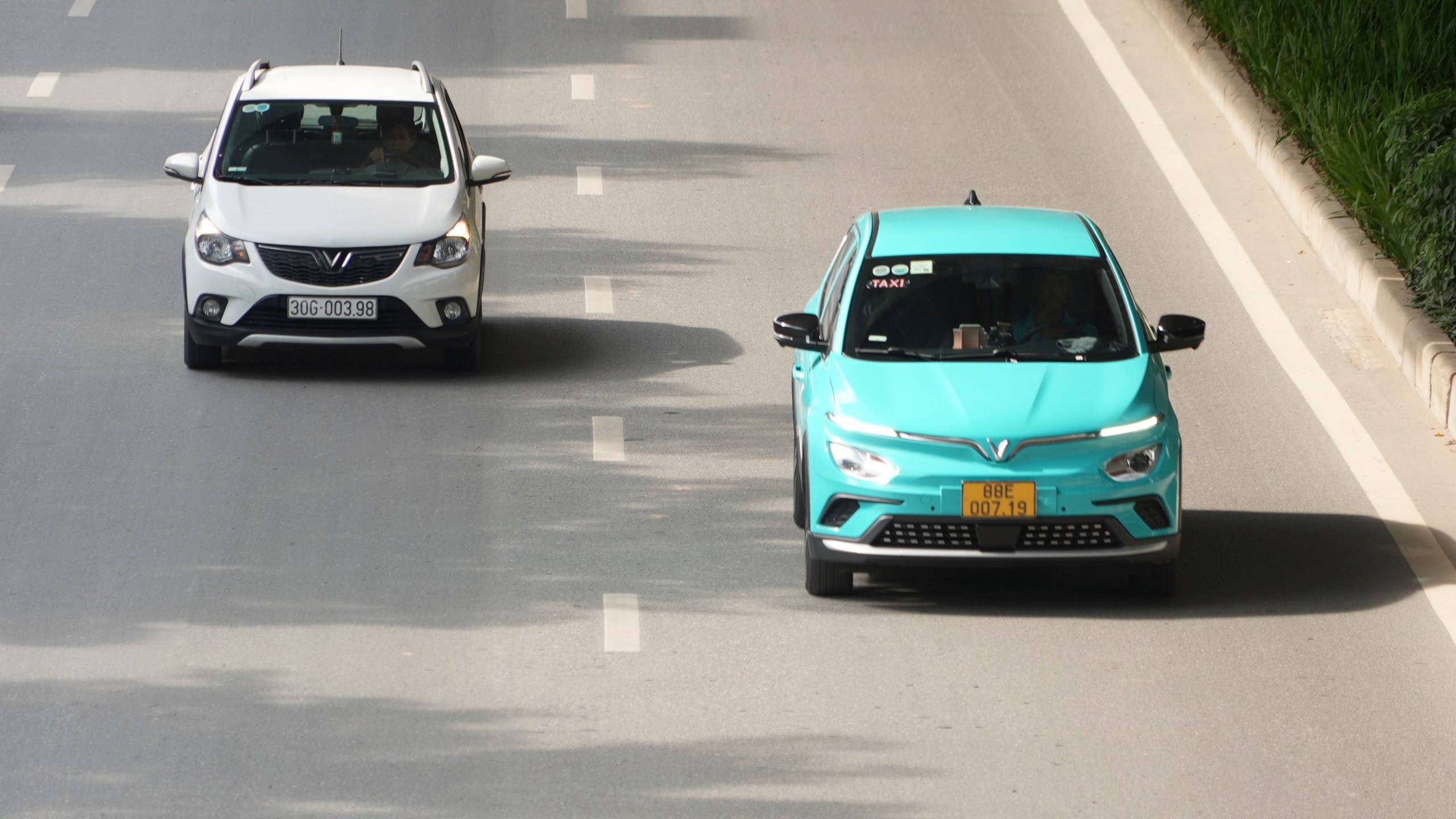 This photo shows Vinfast electric cars in traffic in Hanoi, Vietnam on June 10, 2024. Vietnamese automaker VinFast just can’t sell enough cars, so it's hoping its tiniest and cheapest car yet — a roughly 10-foot-long mini-SUV priced at $9,200 and called the VF3 — will become Vietnam's “national car" and win over consumers in Asian markets. (AP Photo/Hau Dinh)