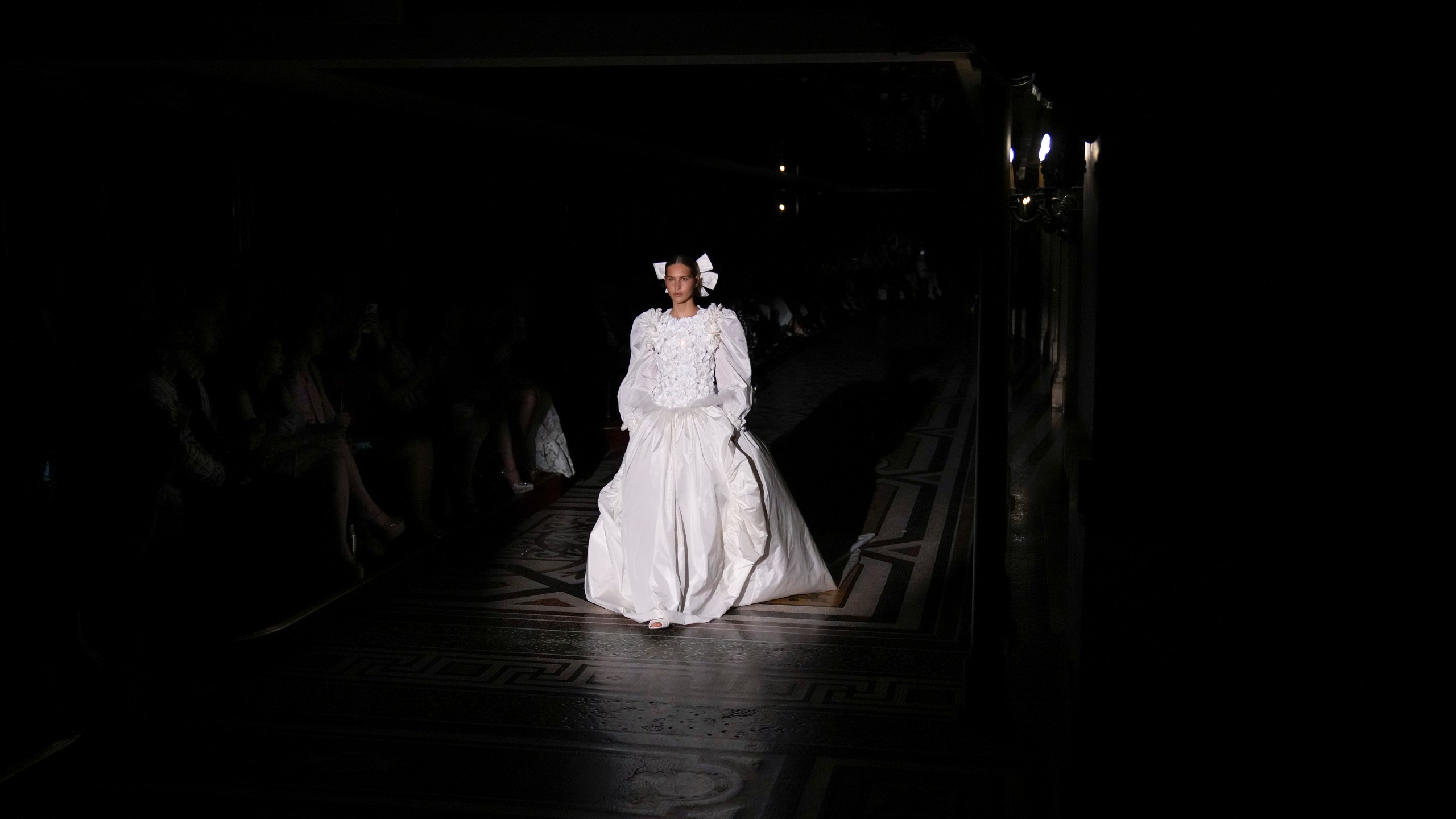 A model wears a creation for the Chanel Haute Couture Fall-Winter 2024-2025 collection presented Tuesday, June 25, 2024 in Paris. (AP Photo/Christophe Ena)