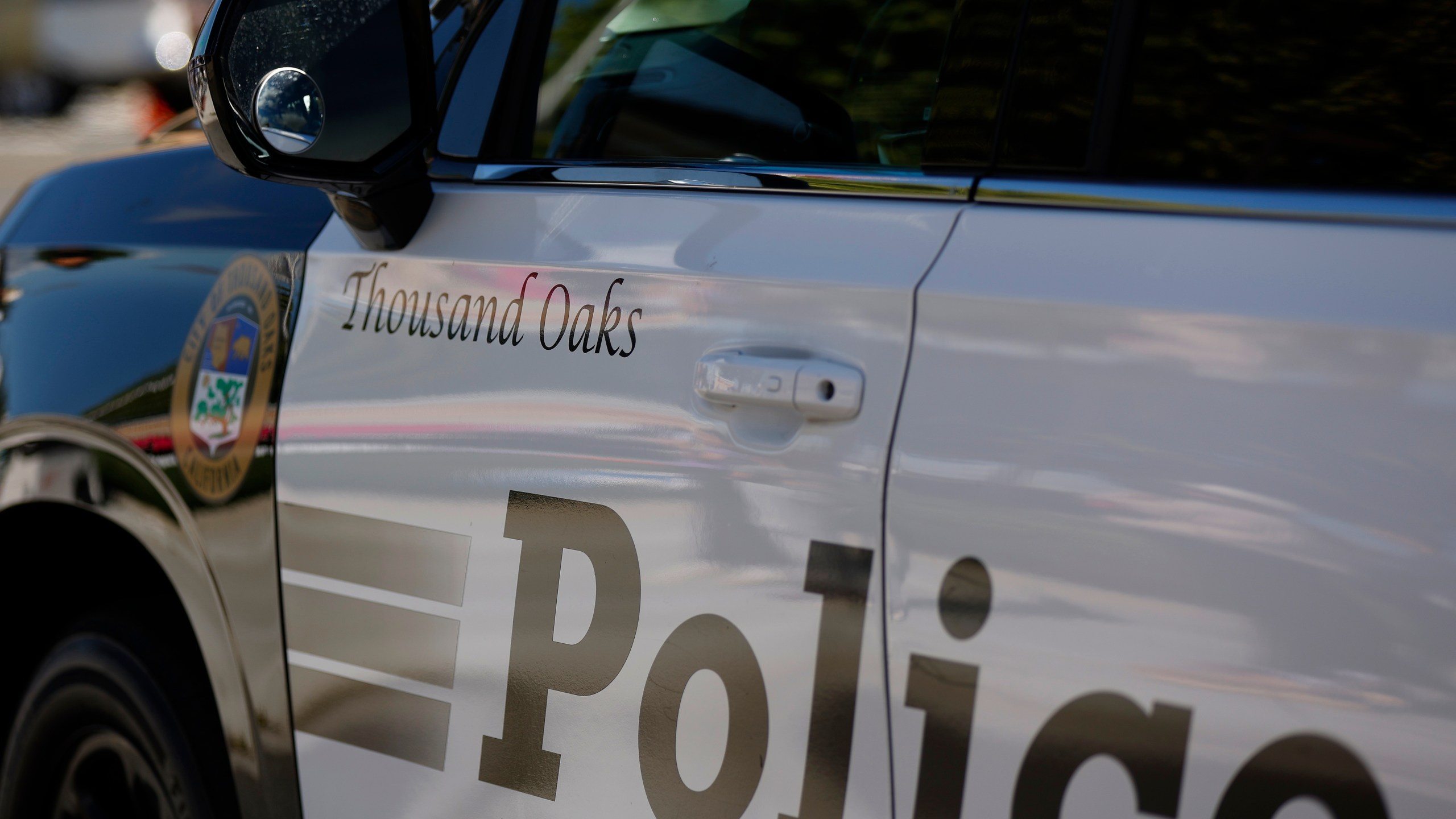 A Thousand Oaks Police vehicle with the city logo is parked on May 5, 2024 in Thousand Oaks, California. Thousand Oak's law enforcement services are contracted to the Ventura County Sheriff's Office. (Photo by Kevin Carter/Getty Images)