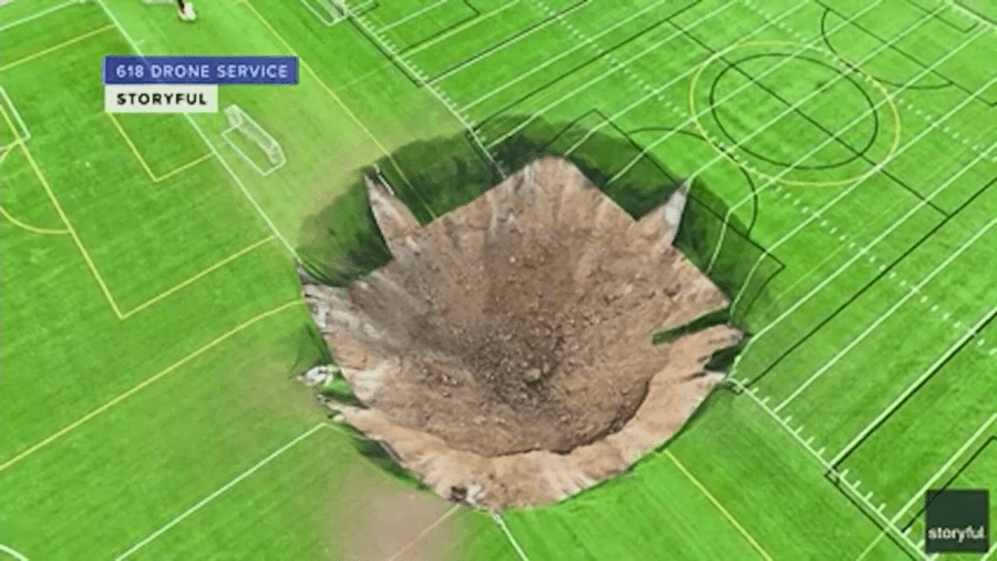 Massive sinkhole opens up at a soccer field in Illinois