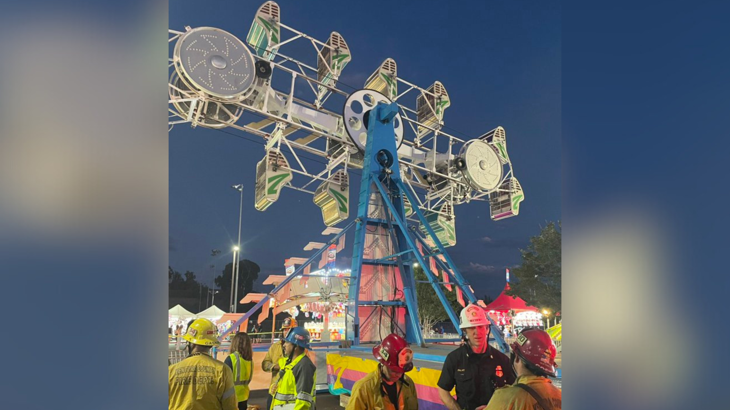 Firefighters rescue trapped amusement park riders