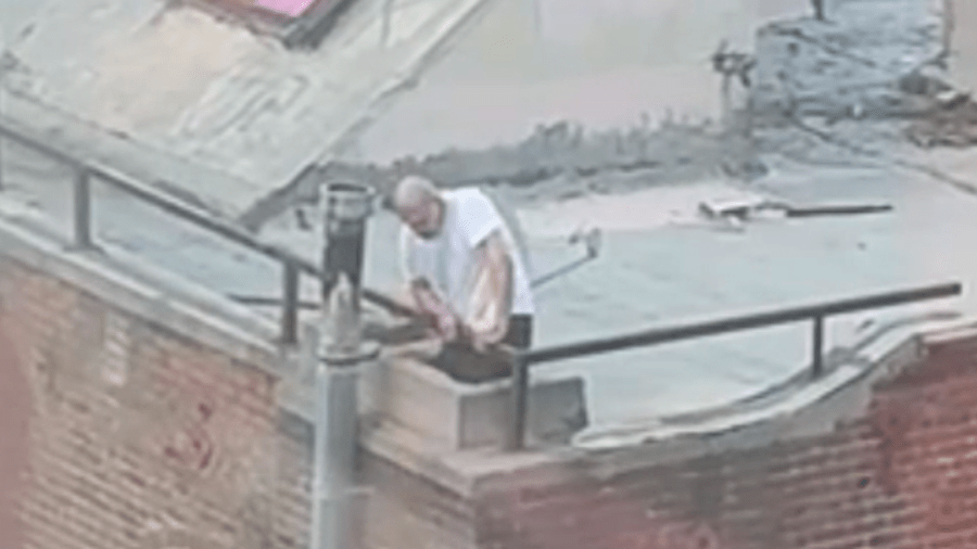 Man climbs into chimney