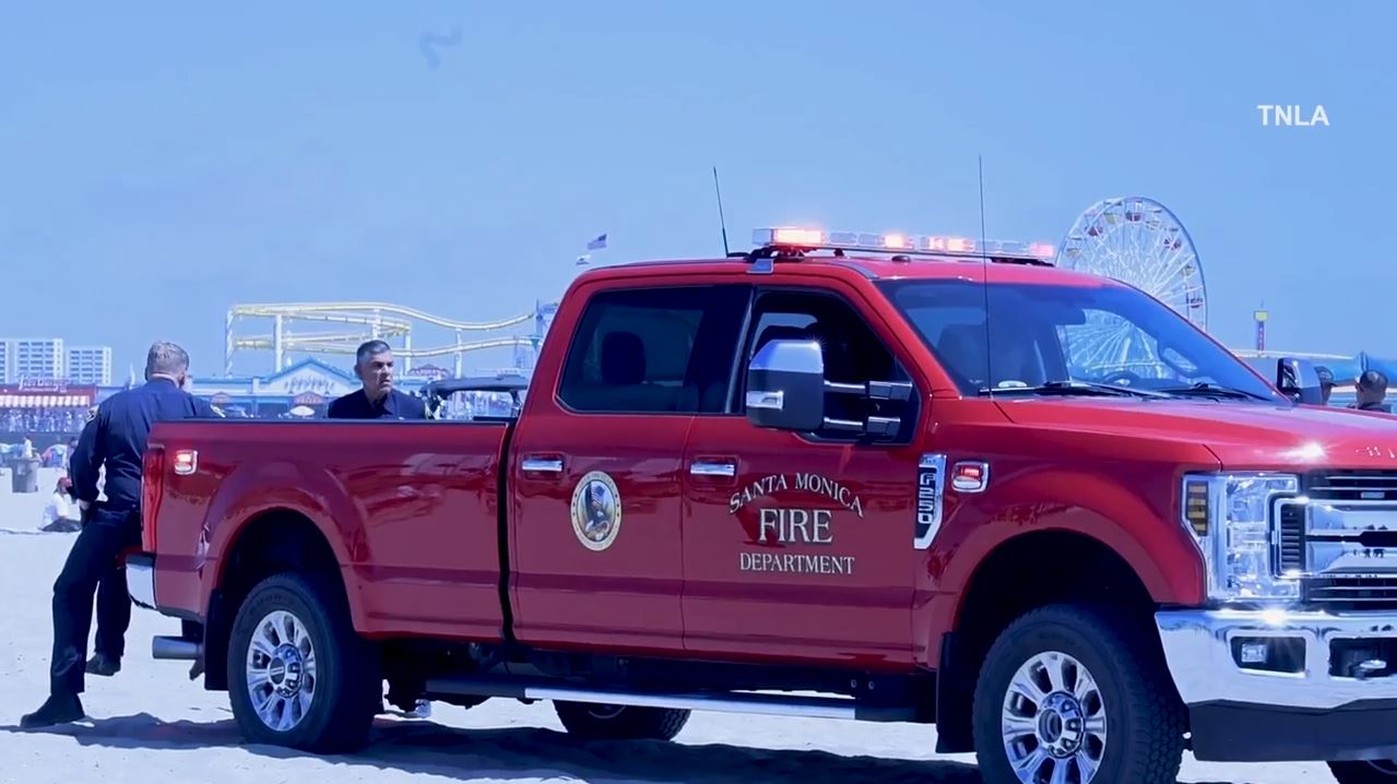 One person was stabbed and another injured after a large brawl broke out on the beach near the Santa Monica Pier on June 29, 2024. (TNLA)