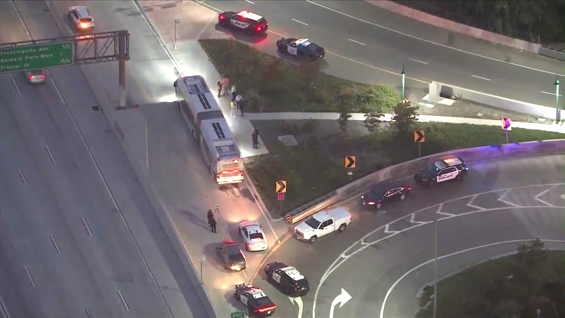 Officers investigate a shooting that took place during an argument aboard a Foothill Transit bus in Baldwin Park on June 17, 2024. (KTLA)