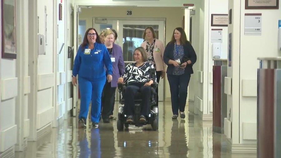 Deanne Niedziela making her last rounds at Providence Mission Hospital in Mission Viejo as her colleagues bid her farewell on her retirement on June 13, 2024. (KTLA)