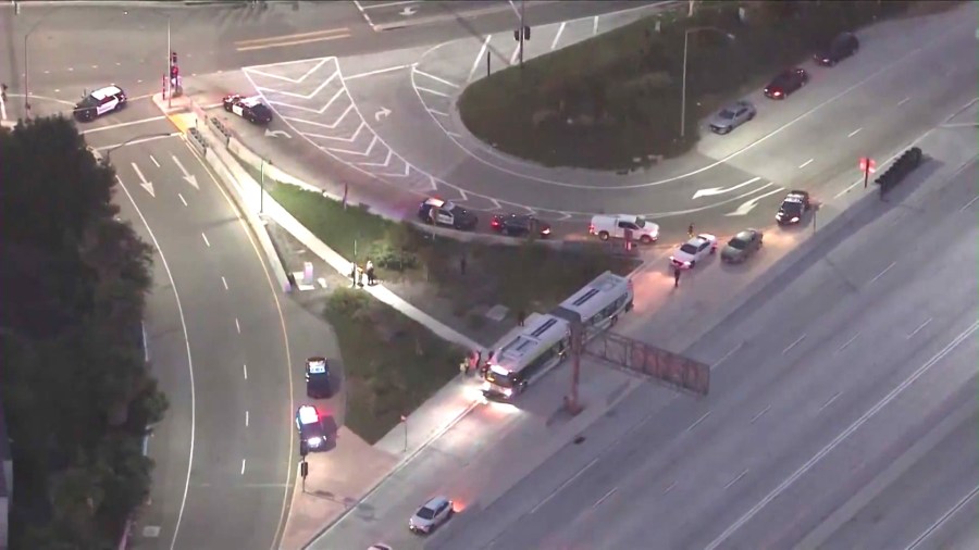 Officers investigate a shooting that took place during an argument aboard a Foothill Transit bus in Baldwin Park on June 17, 2024. (KTLA)