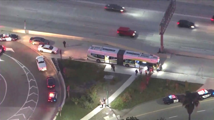 Officers investigate a shooting that took place during an argument aboard a Foothill Transit bus in Baldwin Park on June 17, 2024. (KTLA)