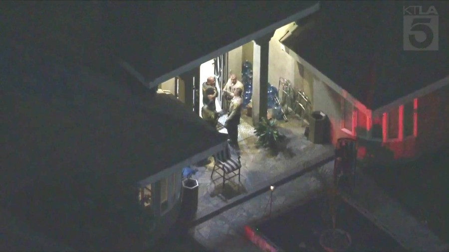 Authorities scour a Compton home after a party shooting left one person dead and four others hospitalized on June 7, 2024. (KTLA)