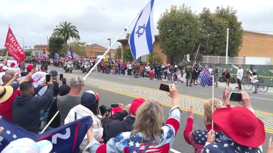 Supporters lined the streets of Newport Beach to await the arrival of Donald Trump's motorcade on June 8, 2024. (KTLA)