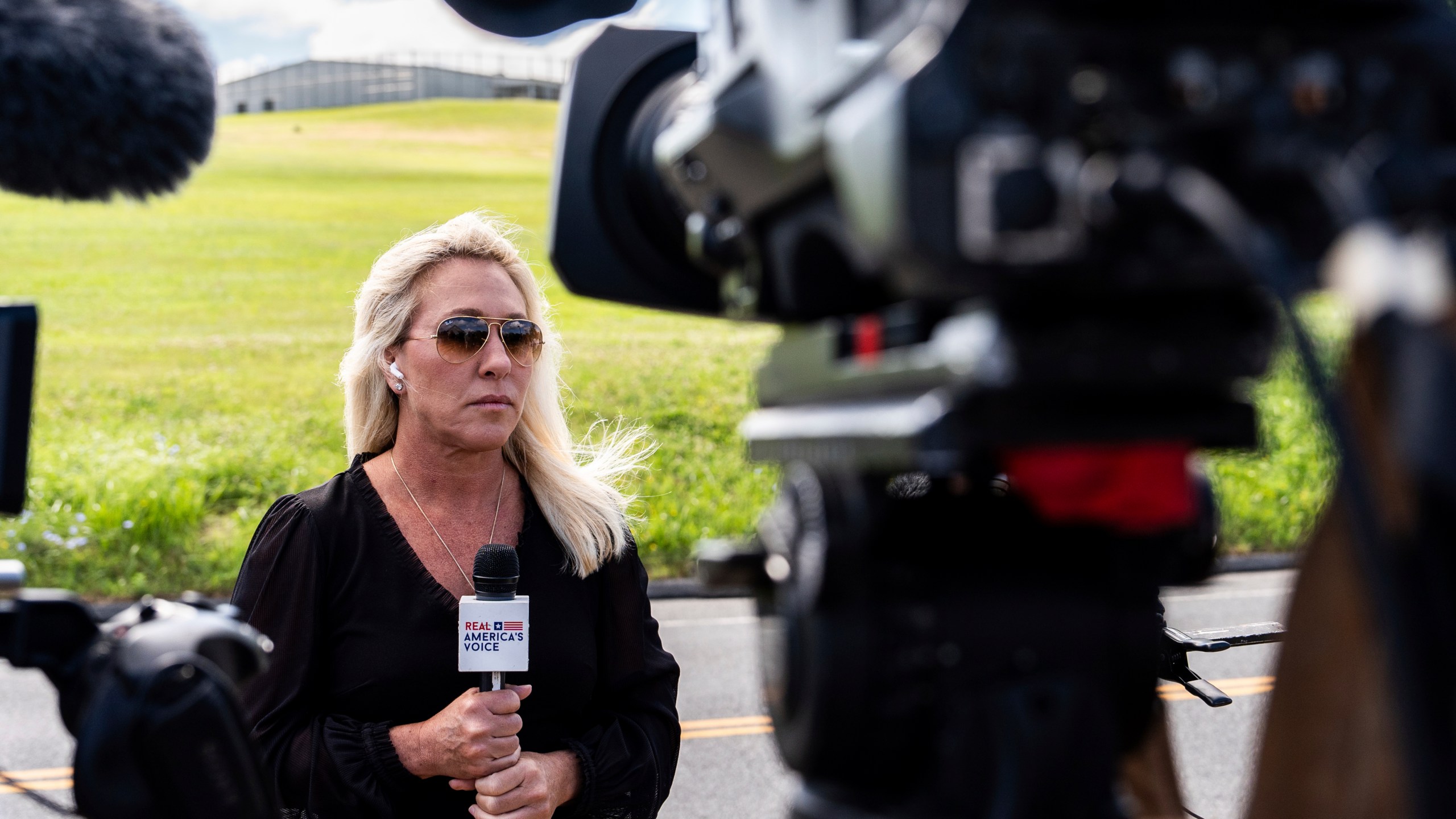 Rep. Marjorie Taylor Greene, R-Ga., speaks outside Danbury Federal Correctional Institution, Monday, July 1, 2024, in Danbury, Conn. Longtime Trump ally Steve Bannon is scheduled to report to federal prison in Connecticut to serve a four-month sentence on contempt charges for defying a subpoena in the congressional investigation into the U.S. Capitol attack. (AP Photo/Julia Nikhinson)