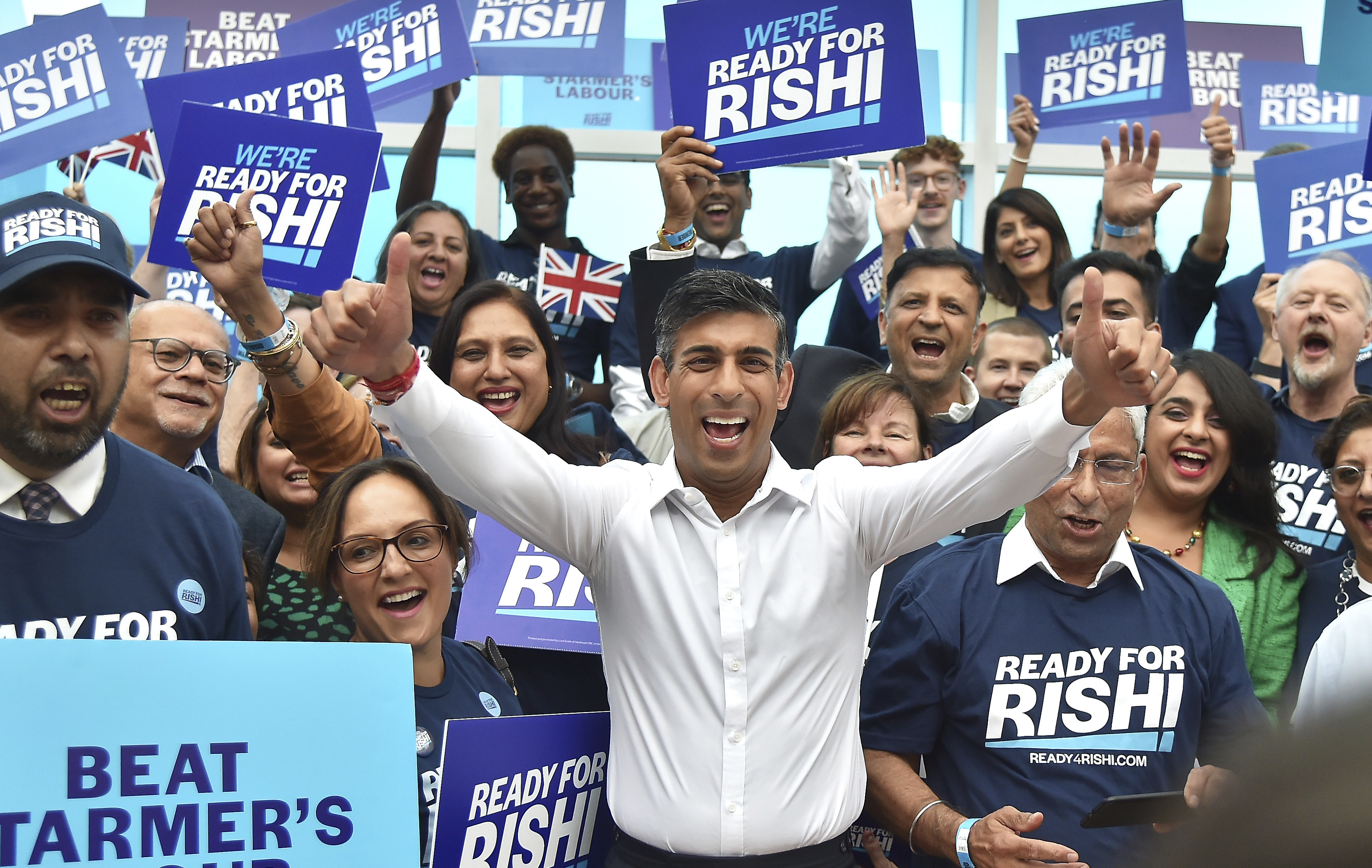 FILE - Rishi Sunak meets supporters as he arrives to attend a Conservative Party leadership election hustings at the NEC, Birmingham, England, Tuesday, Aug. 23, 2022. (AP Photo/Rui Vieira, File)