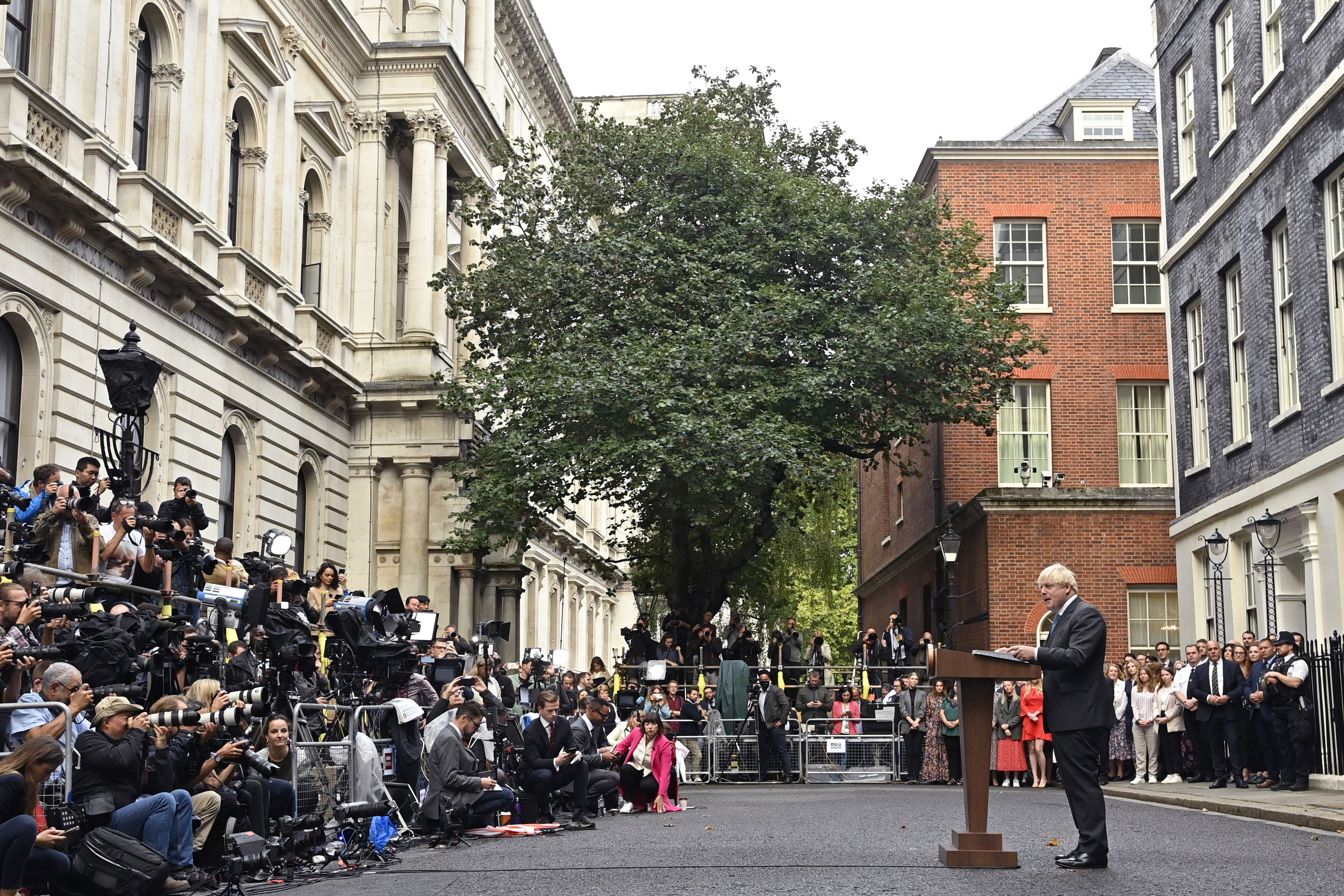 FILE - Outgoing British Prime Minister Boris Johnson speaks outside Downing Street in London, on Sept. 6, 2022, before heading to Balmoral in Scotland, where he will announce his resignation to Britain's Queen Elizabeth II. (Justin Tallis/Pool Photo via AP, File)